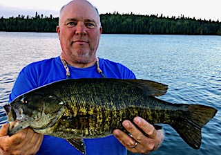 Monster 20-inch Smallmouth Bass by Dan Ramsey at Fireside Lodge in Canada